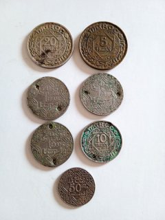 قطع  قديمة للفرنك المغربي عمرها 80 سنة (1366ه المملكة الشريفة) 